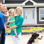 Family in front of house