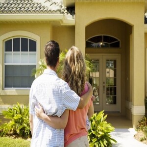 A couple looking at their home in Flower Mound, Texas.