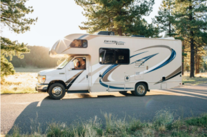 An RV parked on the road.