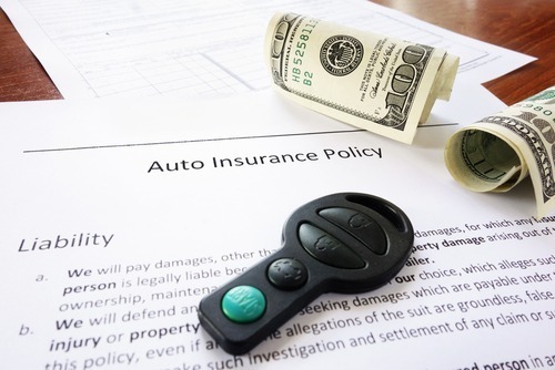 Auto,Insurance,Policy,With,Cash,And,Key,Fob