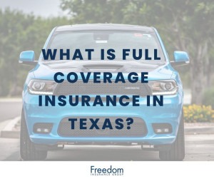 A blue Dodge car on a road.