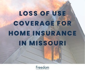 The roof and top window of a burning home in Missouri