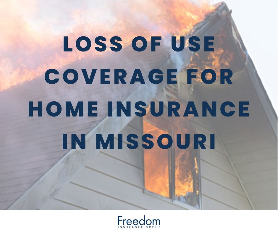The roof and top window of a burning home in Missouri